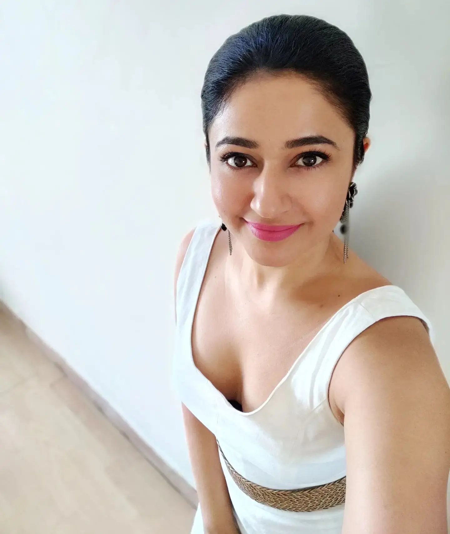 HYDERABAD GIRL POONAM BAJWA LONG LEGS SHOW IN MINI WHITE SKIRT